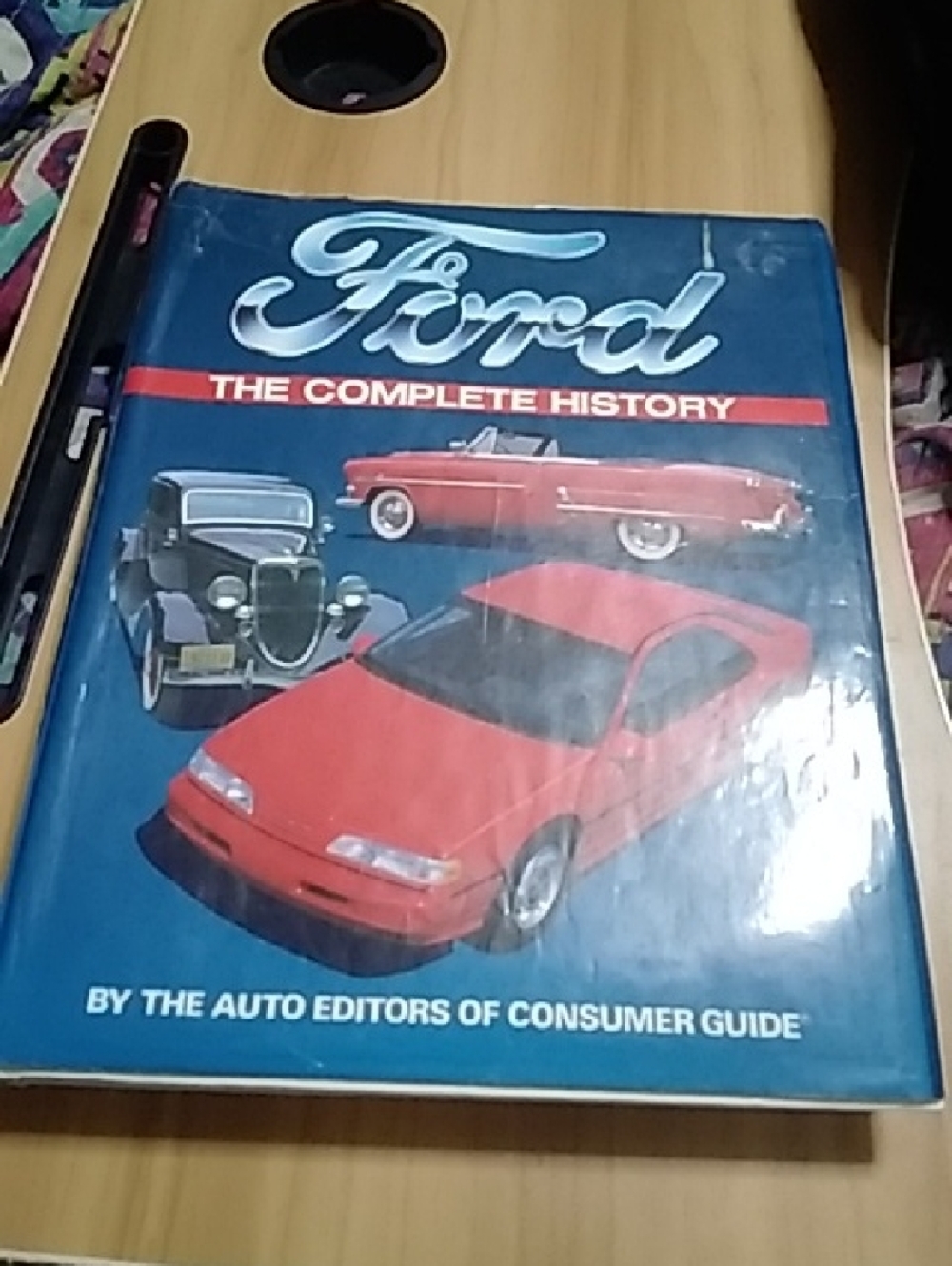 Ford Hardcover Book - Blue Cover with Red Cars